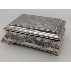 Sterling silver lidded jewellery casket, embossed decorated…