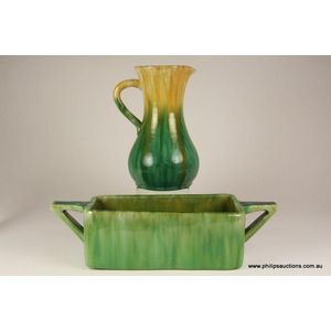 A ceramic jug and jardiniere by John Campbell. 1920s-1930s, the…