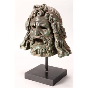 Large cast head of Zeus, depicted with curled hair and beard,…