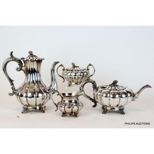 A silverplated four-piece melon shaped tea service, James Dixon…