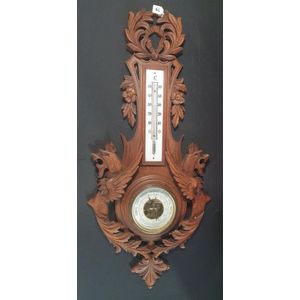An early 20th century German barometer, the wooden case with…