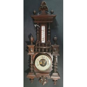 A late 19th century barometer, the wooden case with shell…