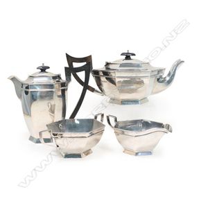 A 1920's silver four-piece tea service, comprising teapot, hot…
