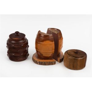 A pair of mulga wood barrel bookends and two timber canisters,…