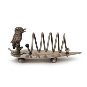 An antique silver plated toast rack of gum leaf form adorned…