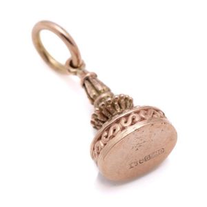 A 9ct rose gold fob seal, tower design with unengraved base,&hellip;