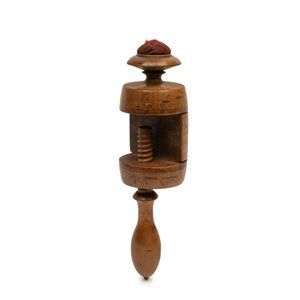 A Victorian treen wooden sewing clamp, 19th century, with a…