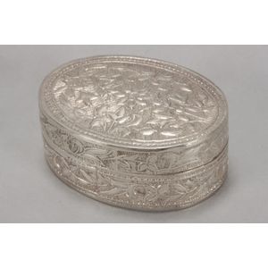 Indian silver pill box and cover, of oval form, lightly…