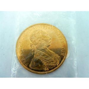 A 1915 Hungarian four Ducat gold coin; 23.75ct gold. Weight 13.…