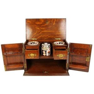 Oak carved wall mounted tobacco cabinet with two doors and…