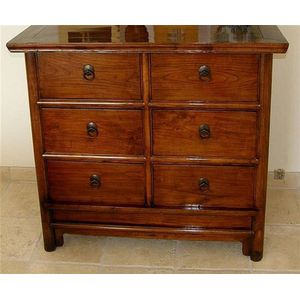 A Chinese six drawer chest of drawers of hardwood with a light ...