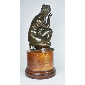 A good quality mid 19th century bronze figure of the crouching…