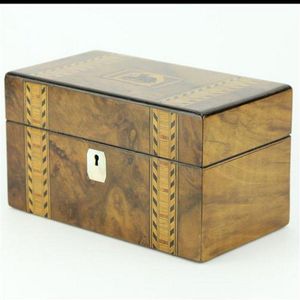 Tunbridge ware burr timber tea caddy having a central panel…