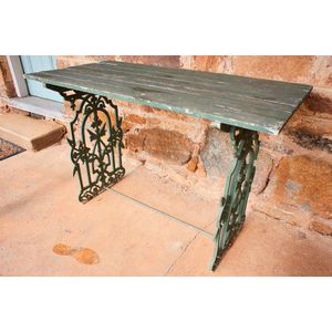 Cast iron garden table, in the style of Christopher Dresser,…
