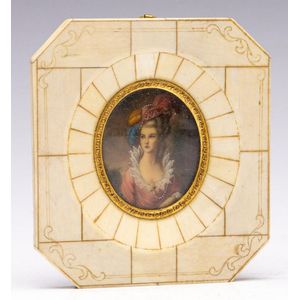 An ivory framed miniature of a woman, signed lower right 13 x…