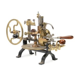 A large and rare brass and steel watchmaker's gear cutting…