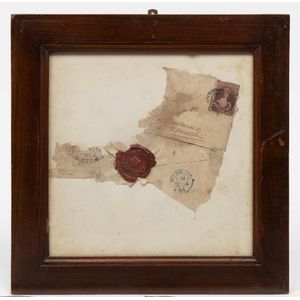 A remnant of an envelope bearing a New Zealand stamp and Royal…