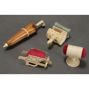 Four 19th century ivory and bone sewing implements including…