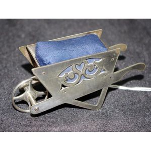Silver plate Wheelbarrow form pin cushion length 11 cm.