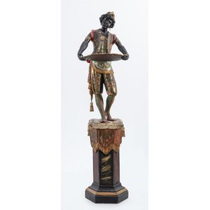 A blackamoor figure of a young boy carrying tray, 19th century,…