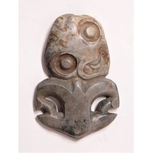 A large pre-European Maori carved pounamu damaged hei tiki,…