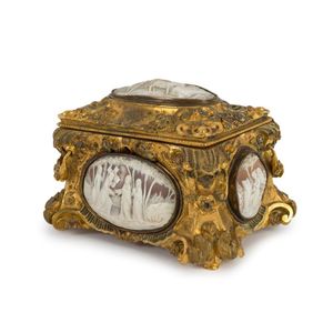 An antique Florentine ormolu casket adorned with five fine…