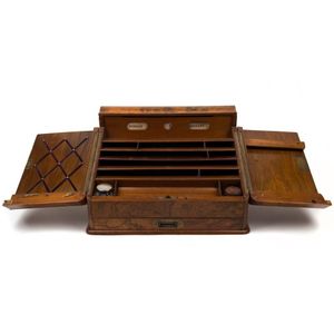 An antique English burr walnut desk compendium with slope top,…