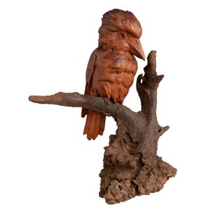 A carved mountain ash figure of a kookaburra by Robert Prenzel,…