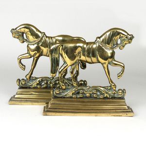 A pair of Victorian brass doorstops, in the form of prancing…