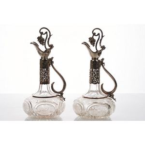Pair of Silver-plate mounted cut crystal claret jugs, c. 1900,…