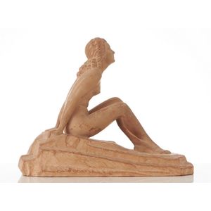 An Art Deco terracotta model of a female nude, signed D.H.…