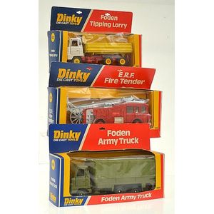 Three Dinky Die cast models, including no. 266 E.R.F. fire…