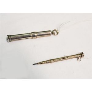 A sterling silver pencil, Sampson Mordan, London 1900, and one…