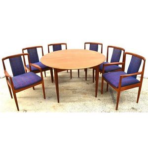 A Parker butterfly extension dining table with four chairs &…