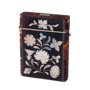 An antique calling card case, tortoiseshell and mother of pearl…