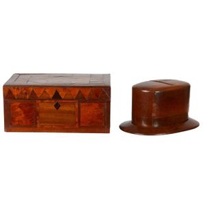 An Australian specimen wood box and a novelty money box in the…