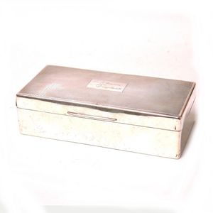 A 1920s large silver cigarette box, long rectangular form,…
