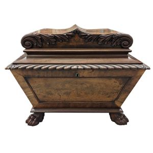 A Regency mahogany cellarette, shaped hinged lid, with acanthus&hellip;