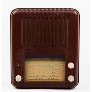 A Healing 'Golden Voice' burgundy bakelite radio, circa 1940,…