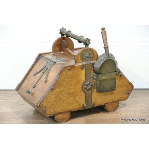 An antique brass Strapped oak coal scuttle with scoop, 19th…