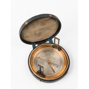 A brass cased field compass retailled by Otto Boettger,…