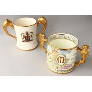 Two twin handled Royal commemorative cups, including Paragon…