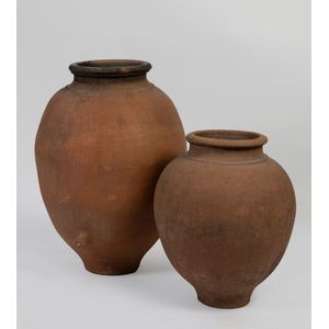 Two large terracotta pots, the largest 76 cm high