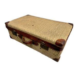 A Japanese rattan, leather with fitted interior traveling…
