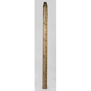 A three drawer surveyor's staff, inscribed 'Improved levelling…