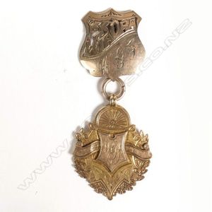 Two early 20th century New Zealand gold fob medallions, one…