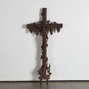 A large French iron antique crucifix, a heavy form cast from…