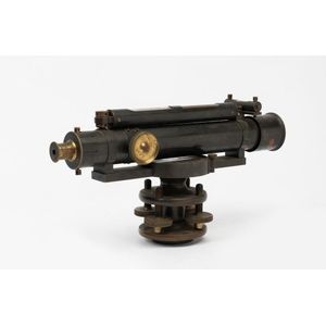 A brass mounted gun metal theodolite, 19 cm high, 35 cm wide