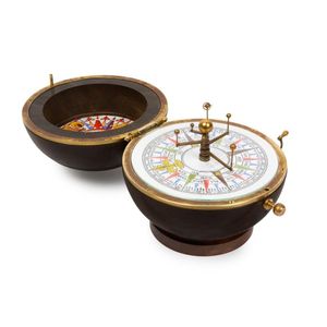 A small cased lawn bowl orrery by George Gyori, with compass…
