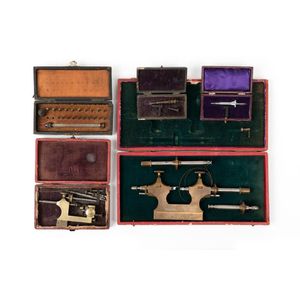 A collection of various precision watchmaker's tools including…